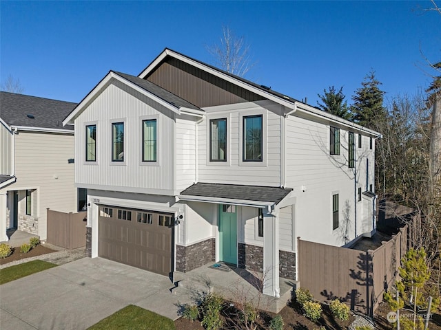 view of front of property with a garage