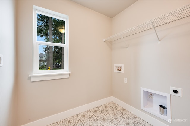 laundry area with washer hookup and hookup for an electric dryer