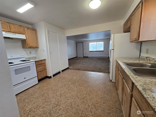 kitchen with baseboard heating, white appliances, and sink