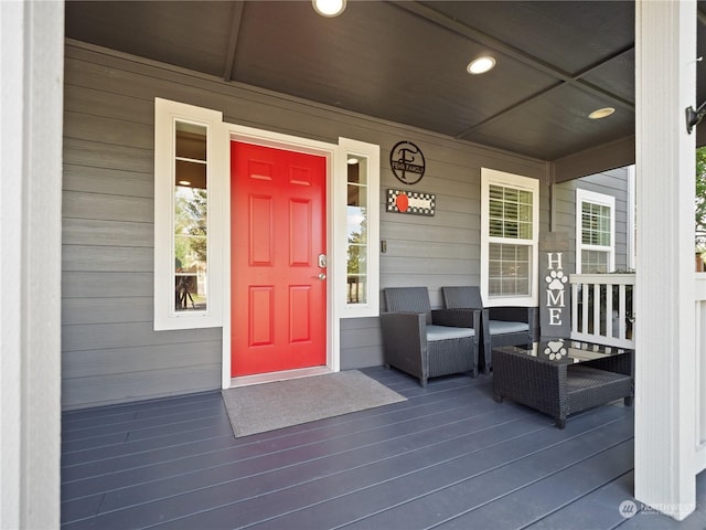 property entrance with covered porch