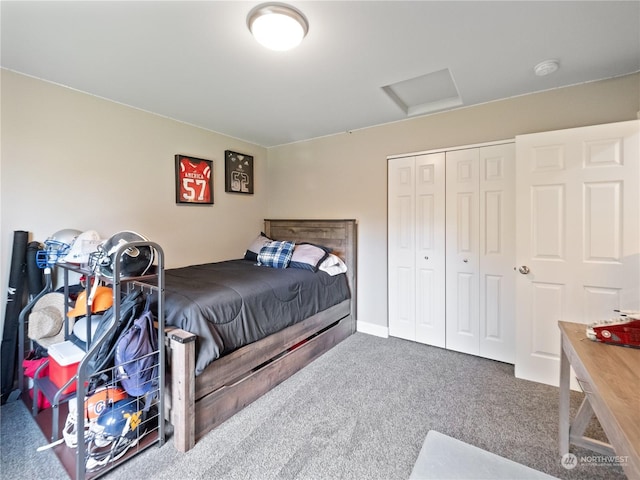 carpeted bedroom with a closet