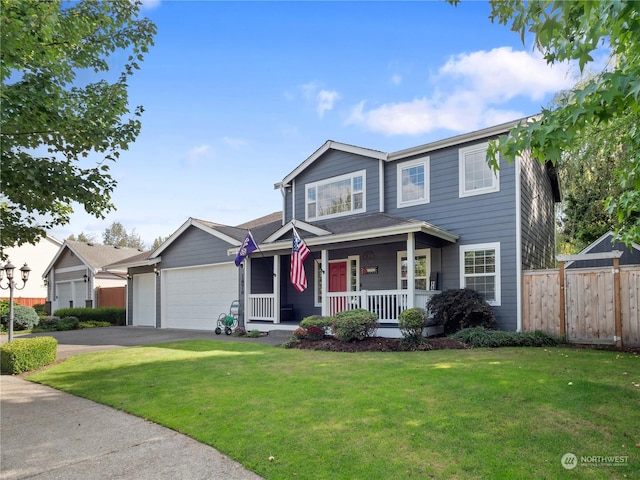 view of front facade featuring a garage, a front yard, and a porch