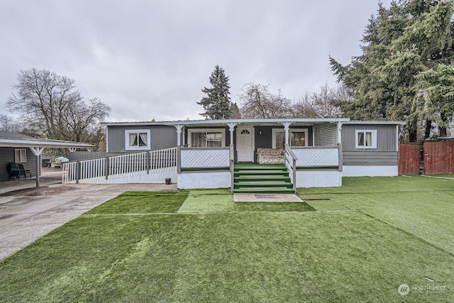 view of front of property with a front yard and a porch