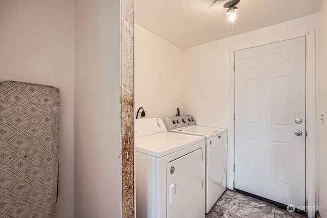 washroom featuring independent washer and dryer