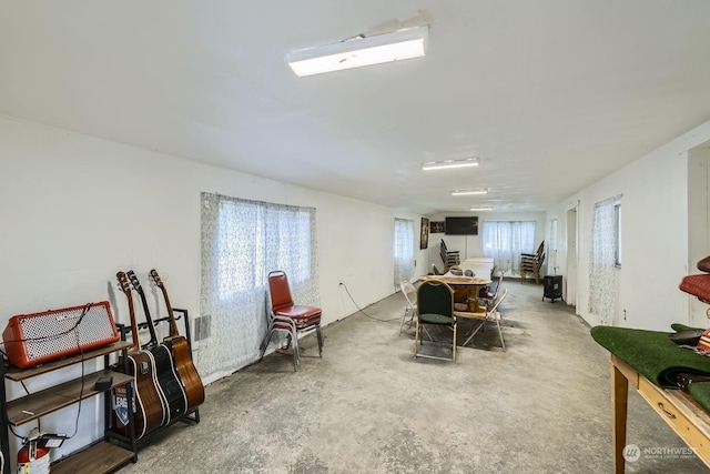 interior space featuring concrete floors