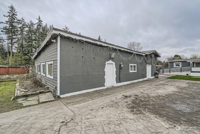 view of home's exterior with a patio area