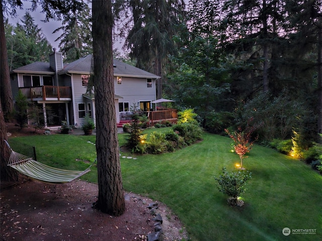 view of yard with a deck