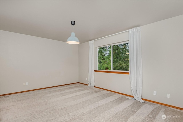 view of carpeted spare room