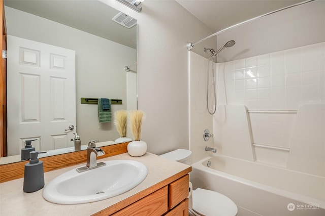 full bathroom with vanity, shower / washtub combination, and toilet