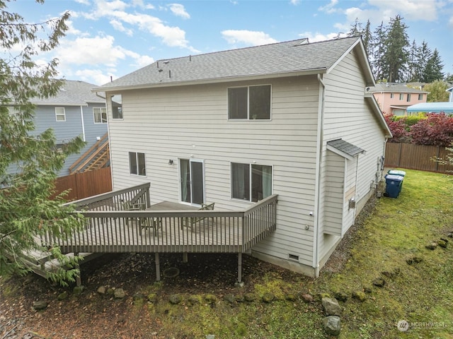 rear view of house with a deck