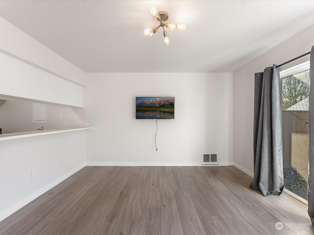 unfurnished living room featuring light hardwood / wood-style floors