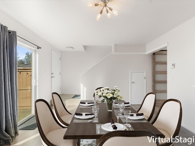 dining room featuring a chandelier