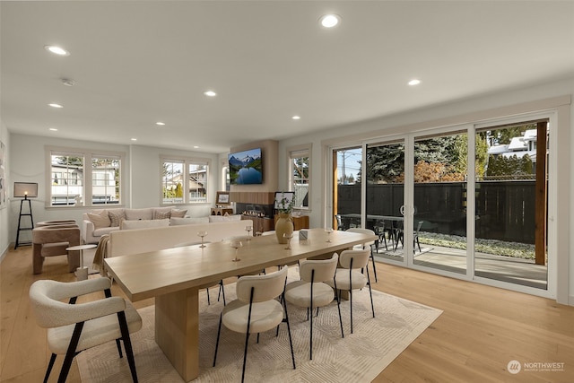 dining space featuring light wood-type flooring