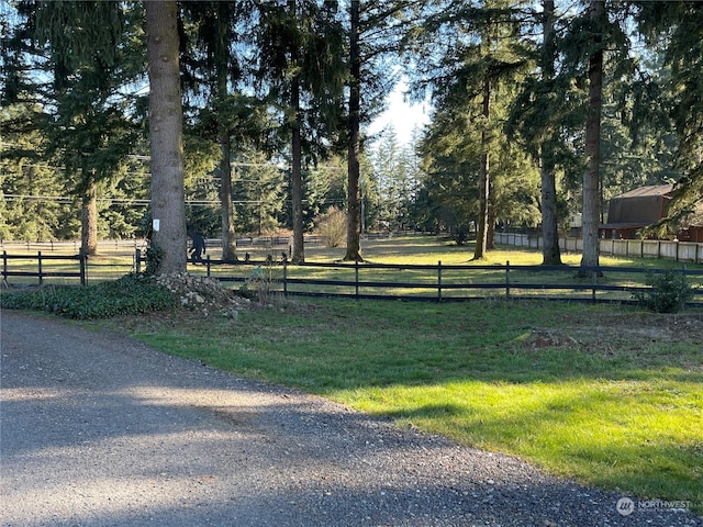 view of community featuring a lawn