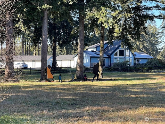 exterior space featuring a front yard