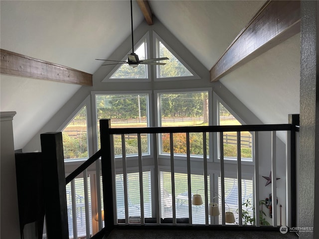 interior details featuring beam ceiling and ceiling fan