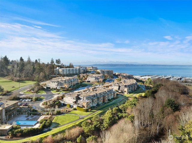 birds eye view of property featuring a water view