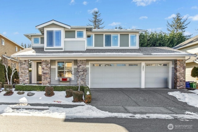 view of front of home with a garage