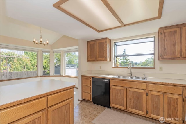 34126 30th Ave SW, Federal Way, WA 98023 - kitchen featuring dishwasher, a sink, light countertops, lofted ceiling, and brown cabinets
