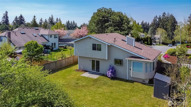 34126 30th Ave SW, Federal Way, WA 98023 - back of house with a shingled roof and a chimney