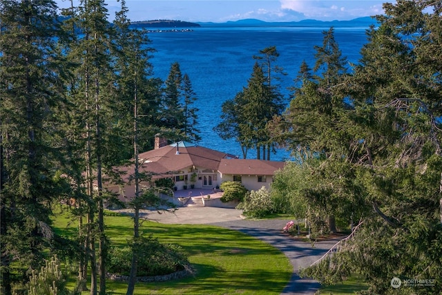 bird's eye view featuring a water and mountain view