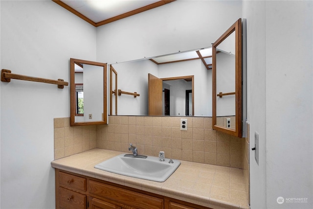 bathroom with vanity, backsplash, and ornamental molding