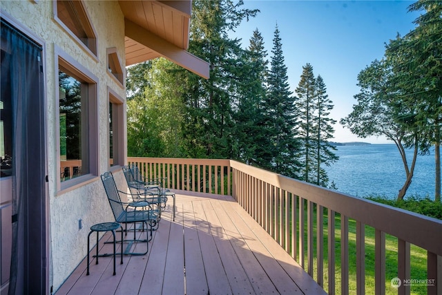 deck featuring a water view