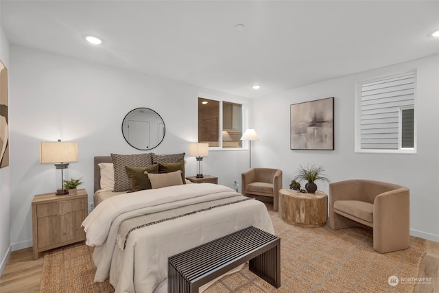 bedroom featuring light hardwood / wood-style floors