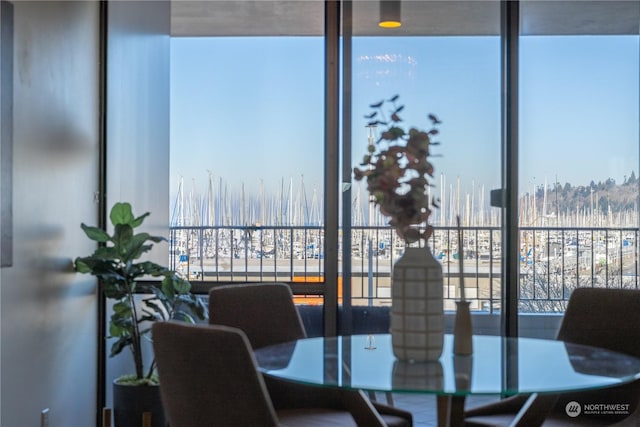 dining room featuring expansive windows