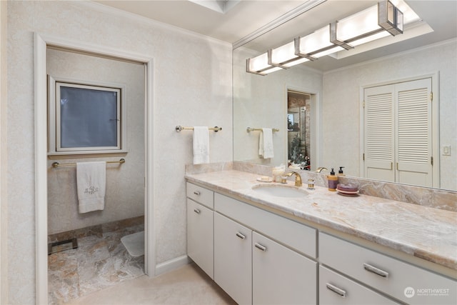 bathroom with vanity and crown molding