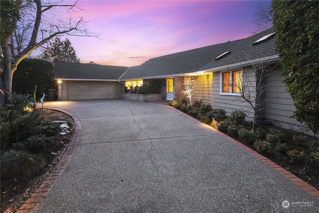 single story home with a garage