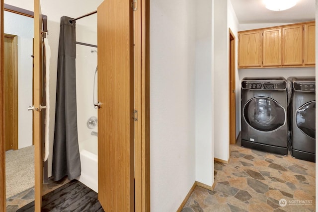 clothes washing area with independent washer and dryer