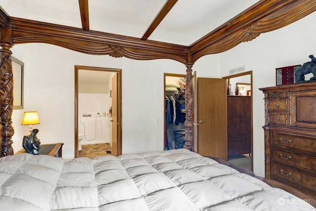 bedroom featuring decorative columns, a walk in closet, connected bathroom, and a closet