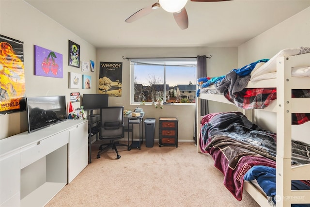 bedroom featuring ceiling fan and light colored carpet