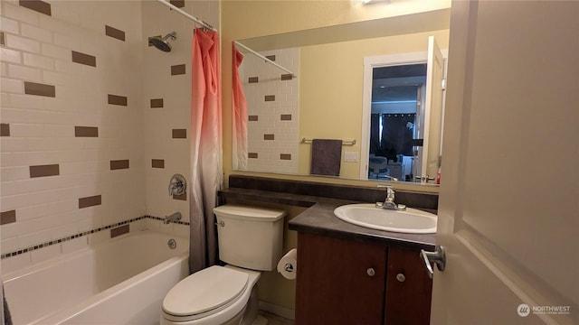 full bathroom featuring shower / bathtub combination with curtain, vanity, and toilet