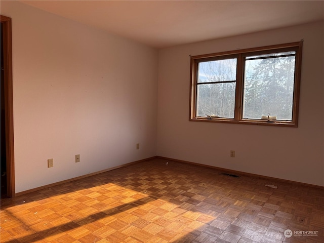 empty room featuring light parquet floors