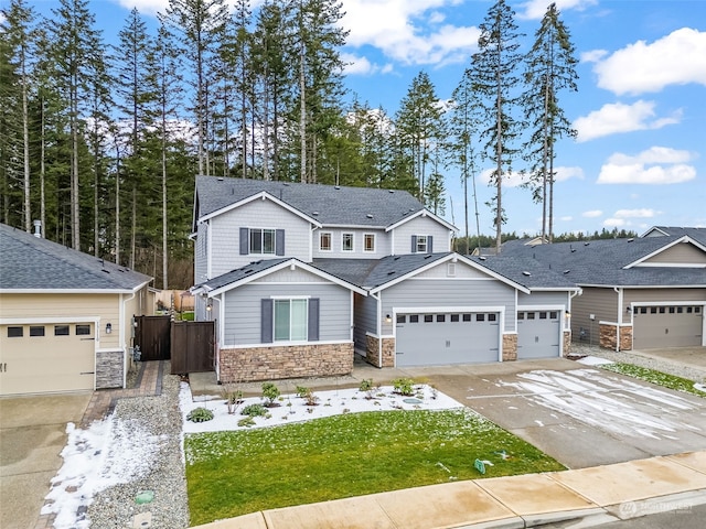 craftsman house with a garage