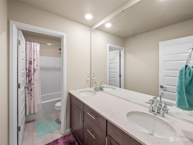 full bathroom featuring shower / tub combo, vanity, tile patterned flooring, and toilet