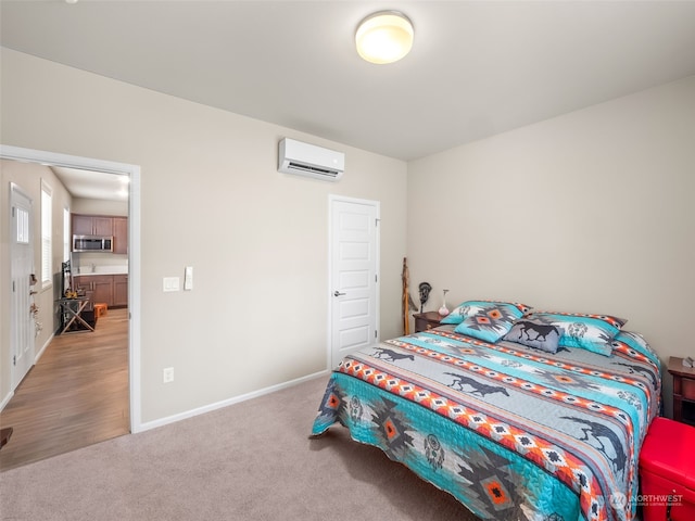 carpeted bedroom featuring a wall mounted air conditioner