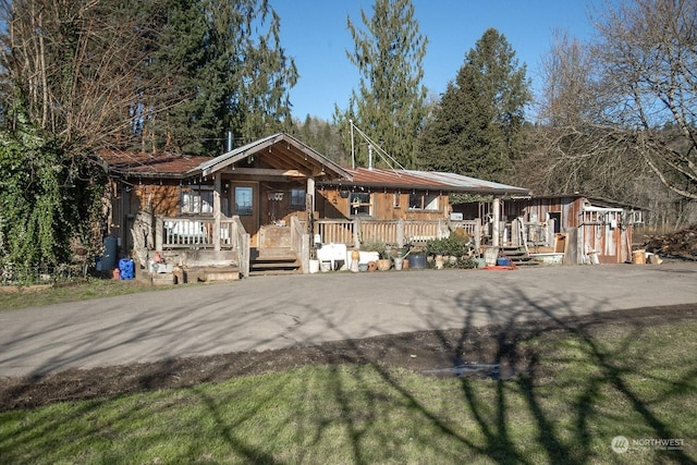 view of front of house with covered porch