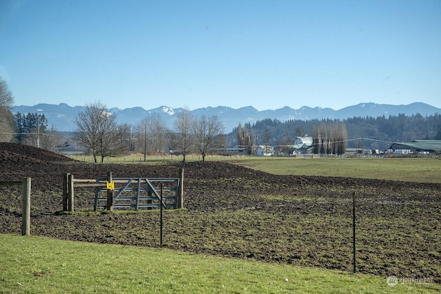 mountain view featuring a rural view