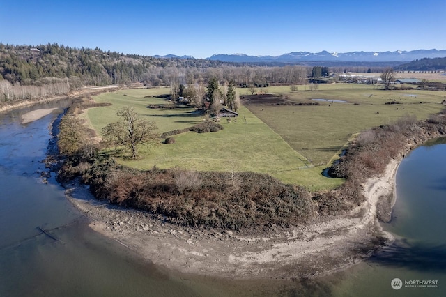 bird's eye view with a rural view and a water and mountain view