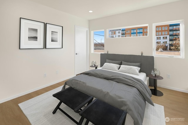 bedroom with light hardwood / wood-style floors