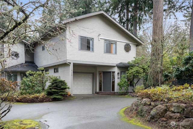 view of front of house with a garage