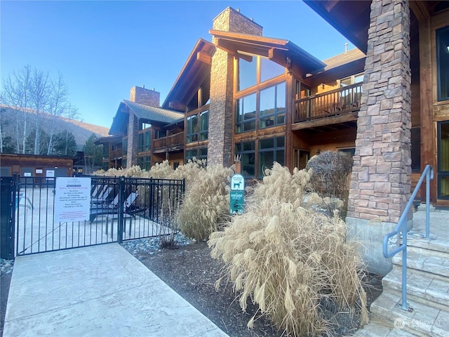 rear view of property with a mountain view