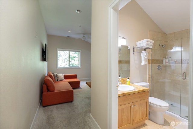 bathroom with lofted ceiling, toilet, an enclosed shower, vanity, and ceiling fan