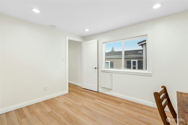 empty room with light wood-type flooring