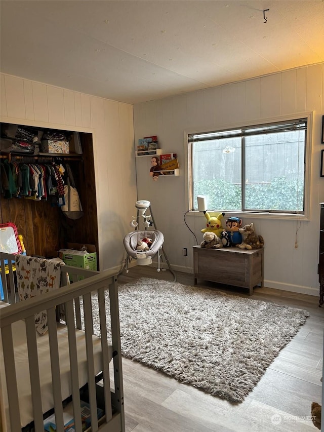 bedroom with light hardwood / wood-style flooring