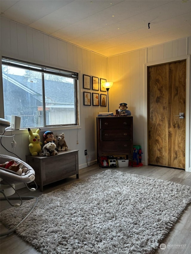 sitting room featuring wood-type flooring