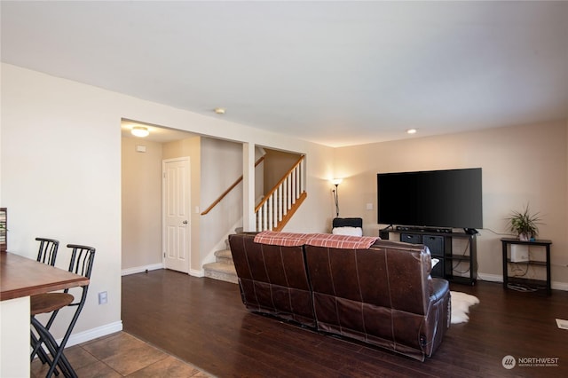 living room featuring dark hardwood / wood-style flooring